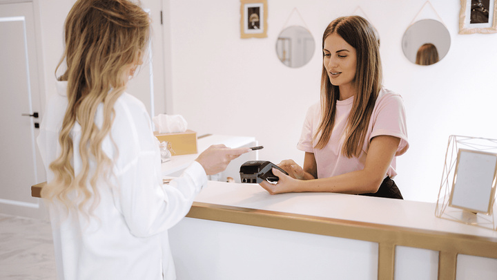 Patient and provider at the front desk